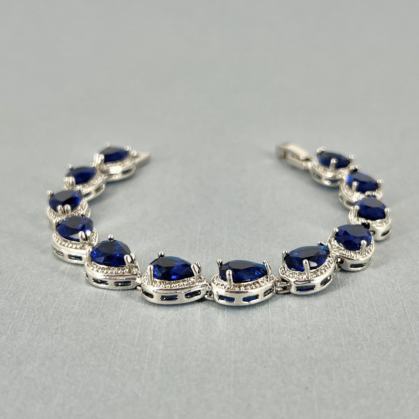 Clearance CZ White Gold Plated Sapphire Blue Teardrop Bracelet