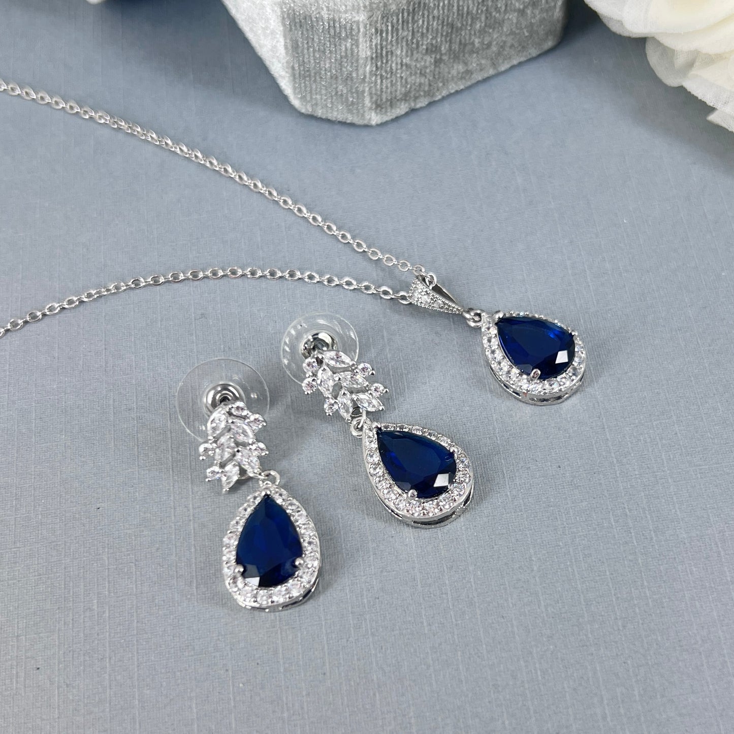 Jewelry set with sapphire blue teardrop-shaped stones.