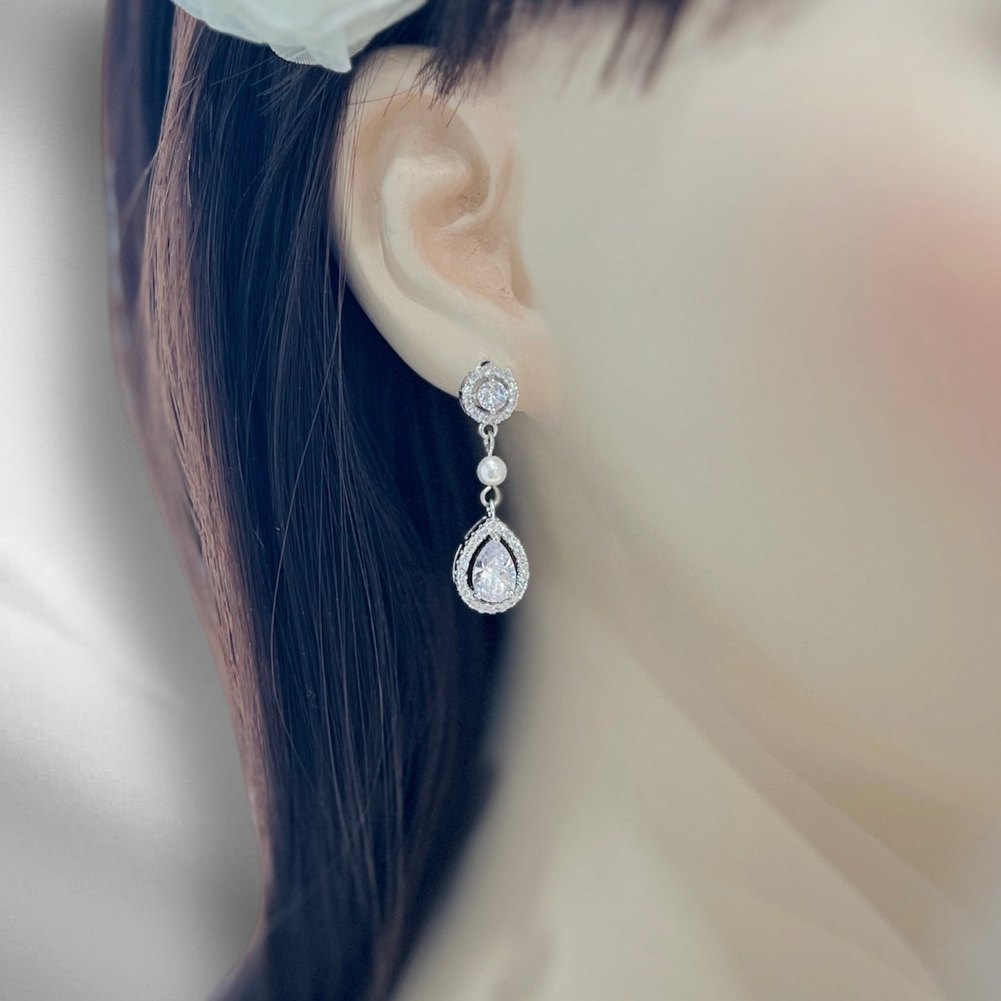 Crystal pearl drop earrings gift idea photographed with clean minimalist styling