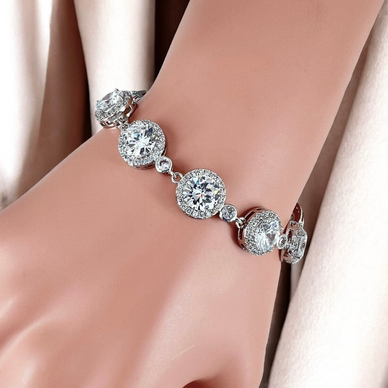 Close-up of crystal bridal bracelet highlighting detailed stone settings 