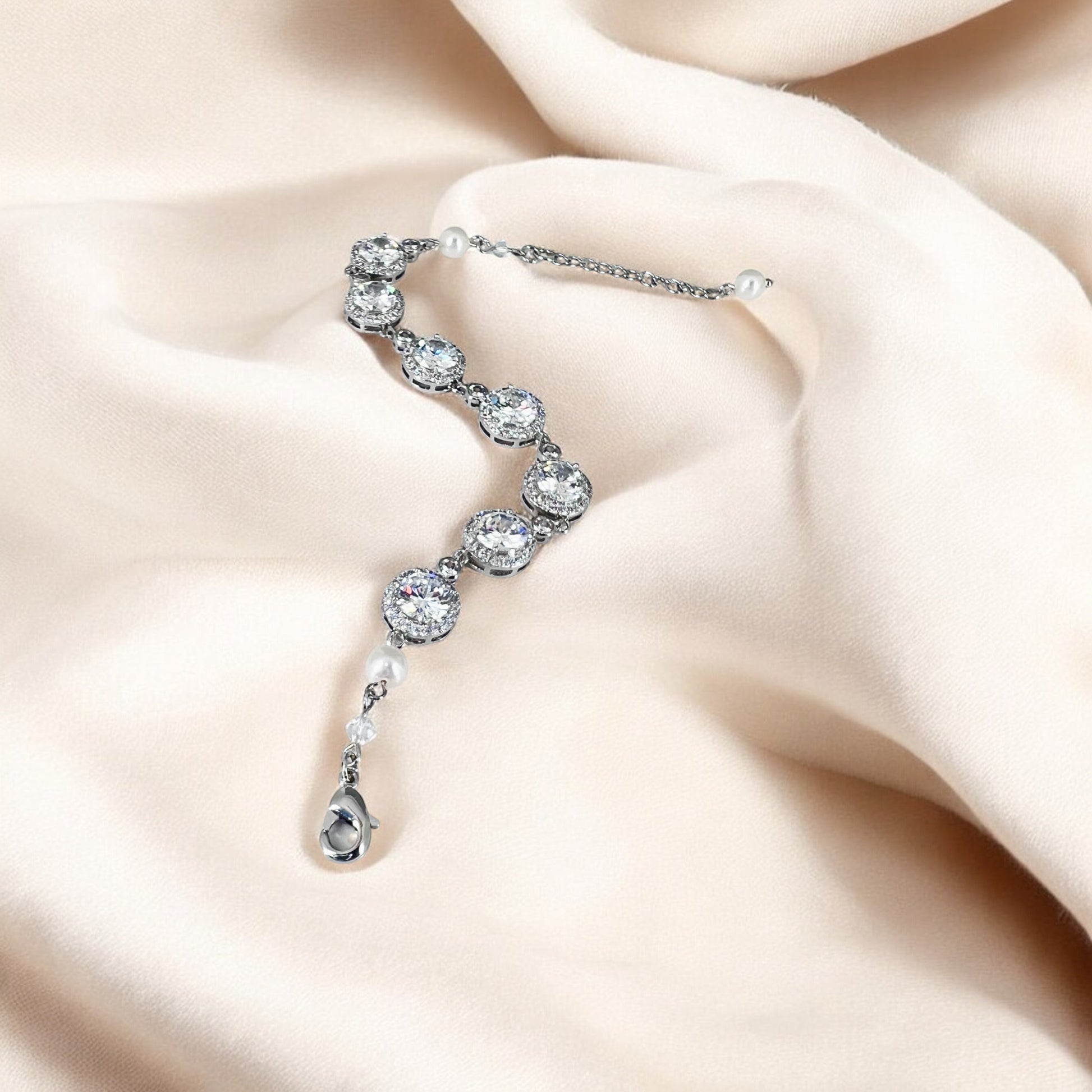 Crystal link bracelet for brides and bridesmaids with soft neutral background and light-catching finish