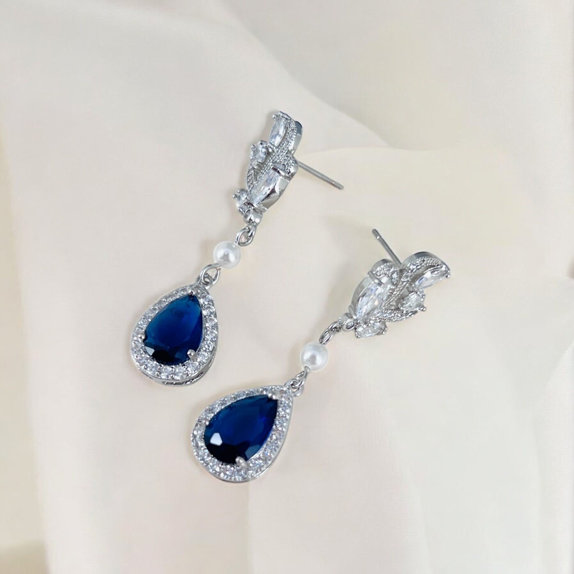 Bridal sapphire earrings with marquise crystal leaves and elegant drop silhouette