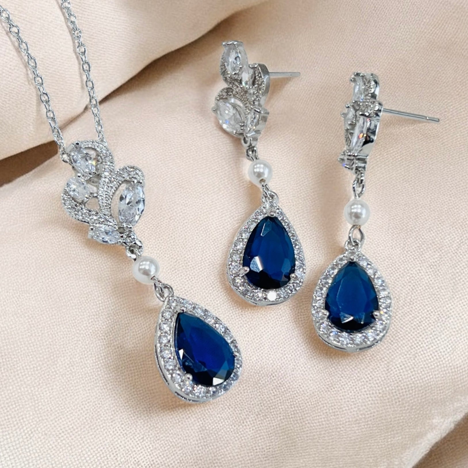 Sapphire blue bridal earrings and necklace designed for wedding ceremonies and formal receptions