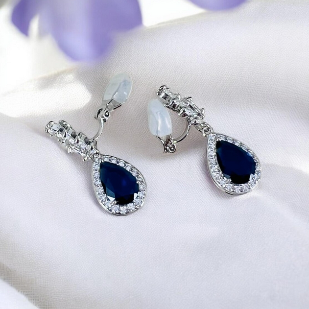 Pair of clip on earrings with sapphire blue teardrop stones 